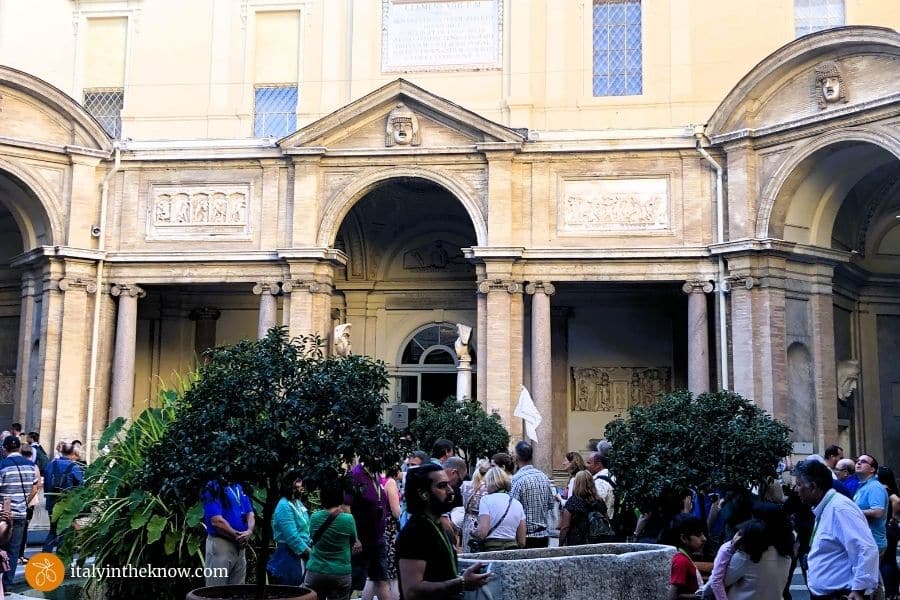Octagonal Courtyard with a moderate crowd of people