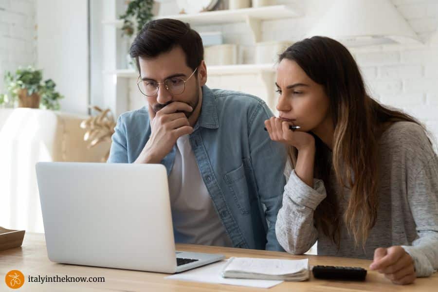 couple looking at laptop screen