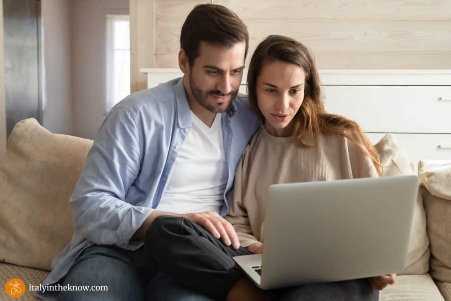 couple looking at laptop screen