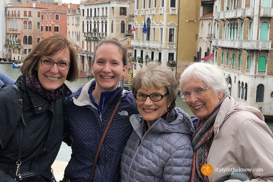 Joyce and three women with Grand Canal and palazzos in Venice