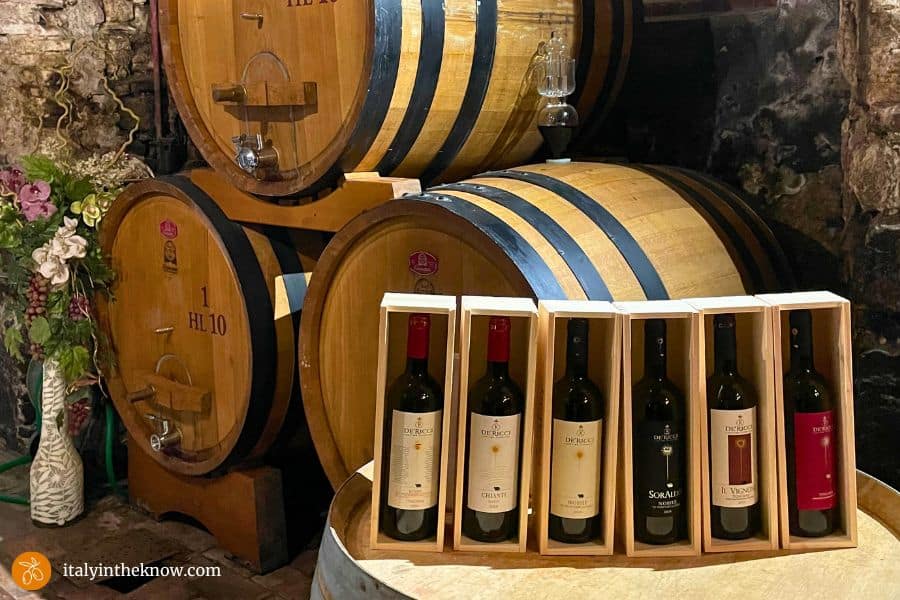 wine bottles and wine barrels