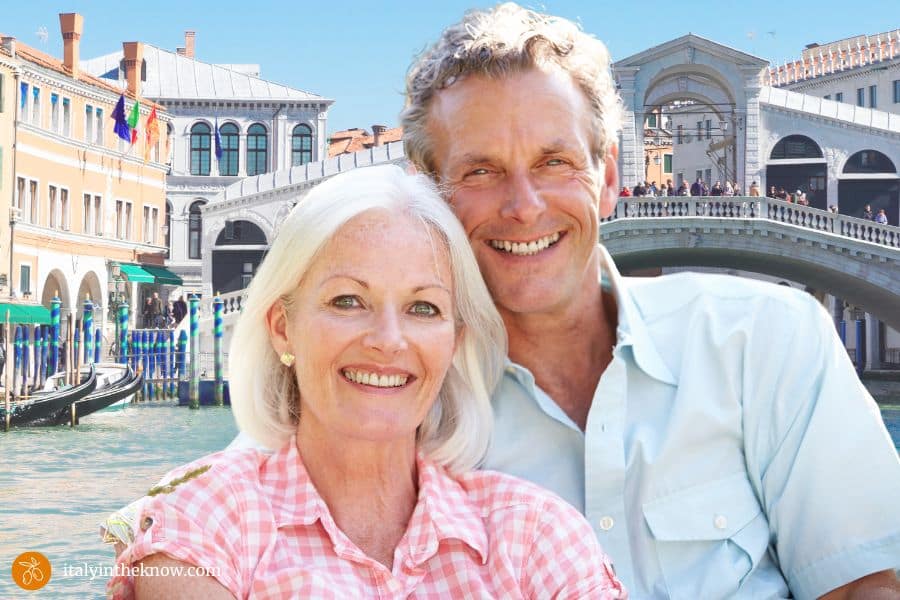 couple in front of the Rialto Bridge in Venice