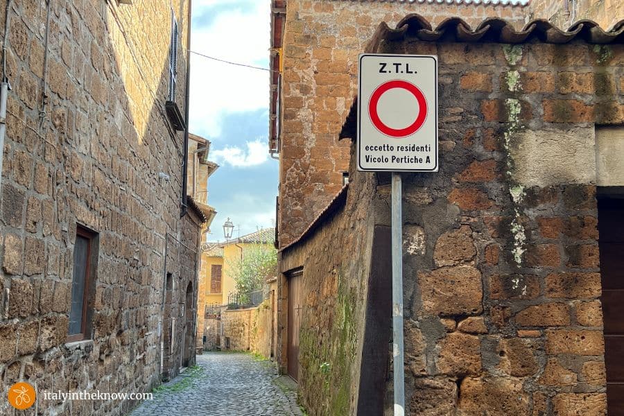 ztl sign and narrow road in Italy
