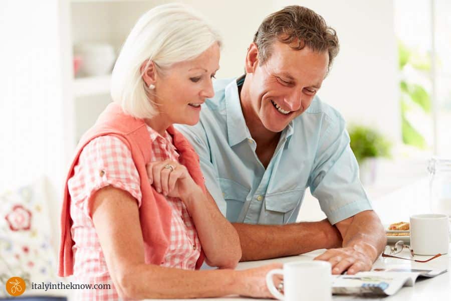 couple looking at travel material